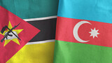 Azerbaijan and Mozambique two flags textile cloth 3D rendering