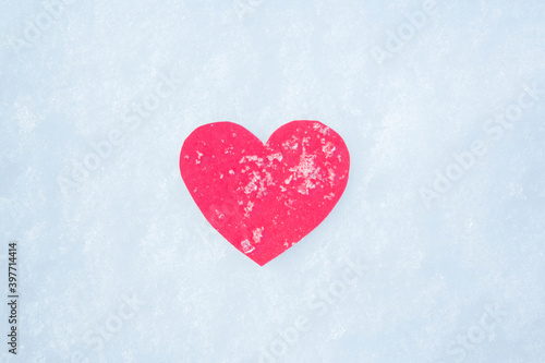 paper red heart on snow with snowflakes. Love winter. Valentine day, mother day, woman day. .
