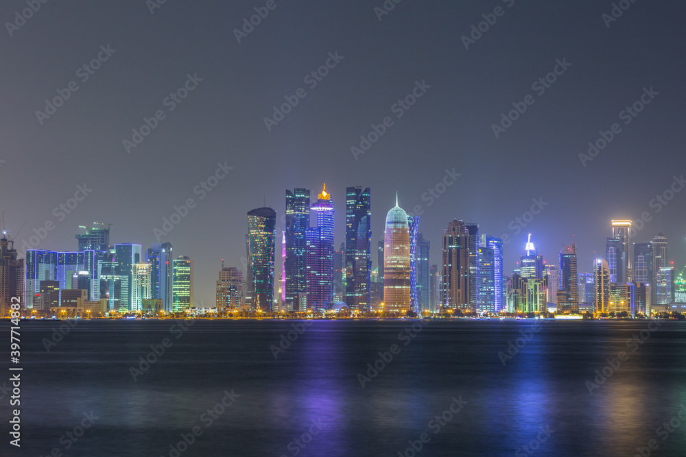 Skyline of Doha city at night, west bay of Doha city center after sunset