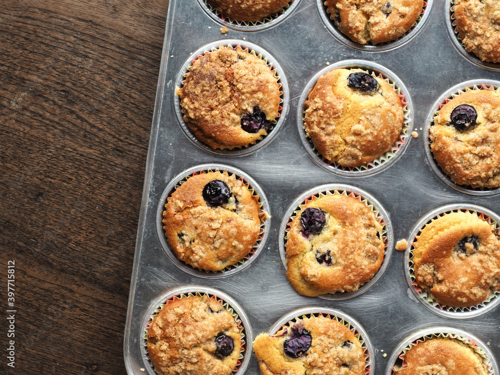 Top view blueberry muffin in baking tray Top view blueberry muffin in baking tray