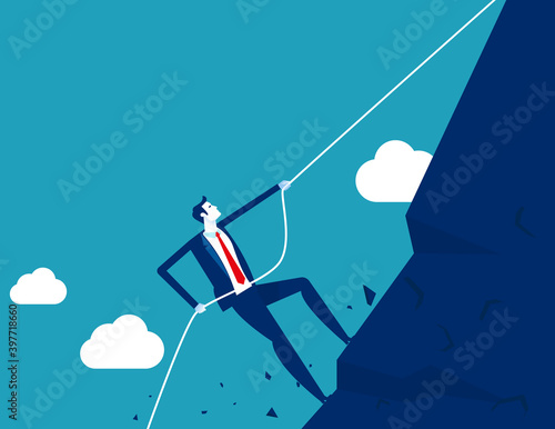 Strong businessman making effort. Climbing mountain with rope and achieving goals