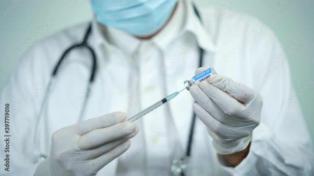 Selective focus, The COVID-19 vaccine is ready for use. Close up syringe and COVID-19 vaccine.COVID-19 vaccine concept. Selective focus, The COVID-19 vaccine is ready for use. Close up syringe and COVID-19 vaccine.COVID-19 vaccine concept.
