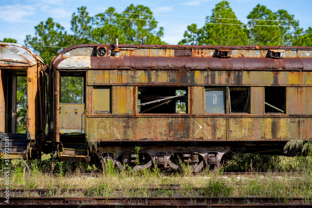 Abandoned old train on tracks photo Abandoned old train on tracks photo