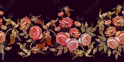 Embroidery vintage buds of roses on black background. Fashionable template for design of clothes, t-shirt design, tapestry flowers renaissance style. Horizontal seamless pattern