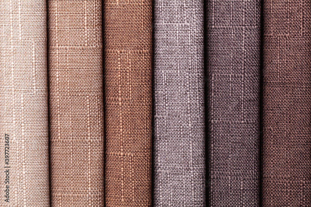 Swatch of woven textile brown and gray colors, background. Swatch of woven textile brown and gray colors, background.