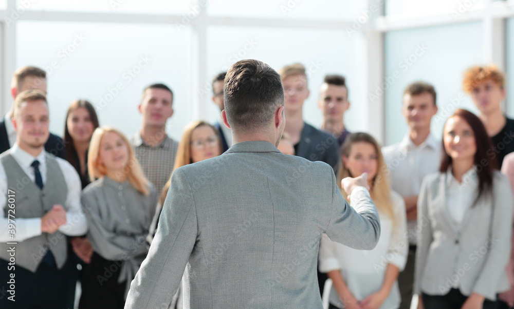 businessman speaking with addressing his business team. businessman speaking with addressing his business team.
