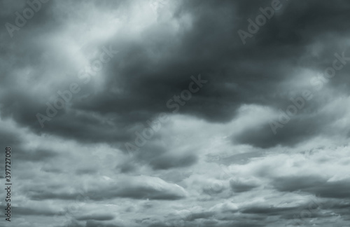 Gray and white fluffy clouds. Cloudy sky. White and gray texture background for sad, death, hopeless, and despair concept. Moody sky. Cloudscape. Dark dramatic sky. Background for dead and gloomy.