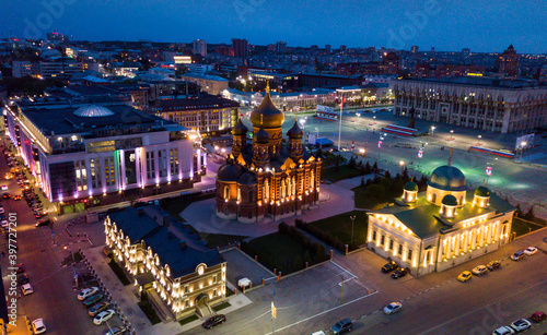 Night cityscape of Russian city Tula with Orthodox Cathedral, Regional administration and Transfiguration Church photo