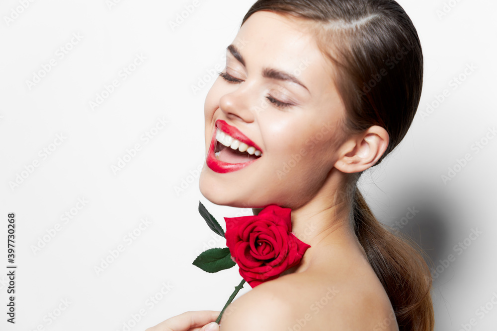 Beautiful woman Naked shoulders closed eyes smile rose flower red lips