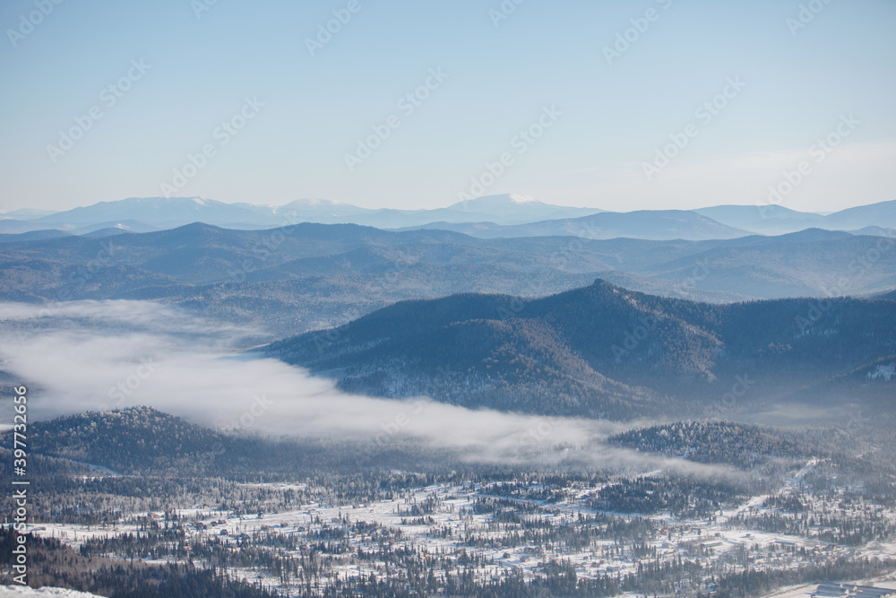 Natural landscape, blue mountains in the distance.