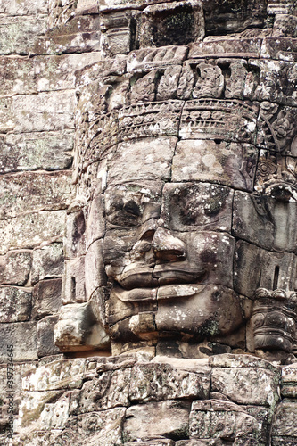 Giant stone face in Prasat Bayon Temple, Angkor Wat complex, Siem Reap, Cambodia
