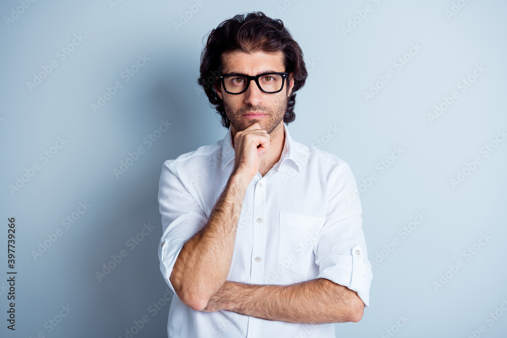 Photo portrait of genius man touching face chin with finger brainstorming isolated on clear white colored background Photo portrait of genius man touching face chin with finger brainstorming isolated on clear white colored background