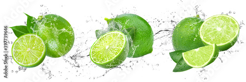 Fresh Limes with water splash on isolated white background