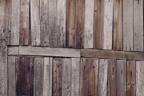 Wooden wall made of old wooden slats. Background  texture.