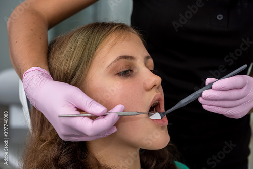 patient on review in young dentist in clinic