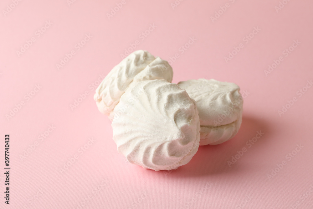 Sweet marshmallow on pink background, close up Sweet marshmallow on pink background, close up