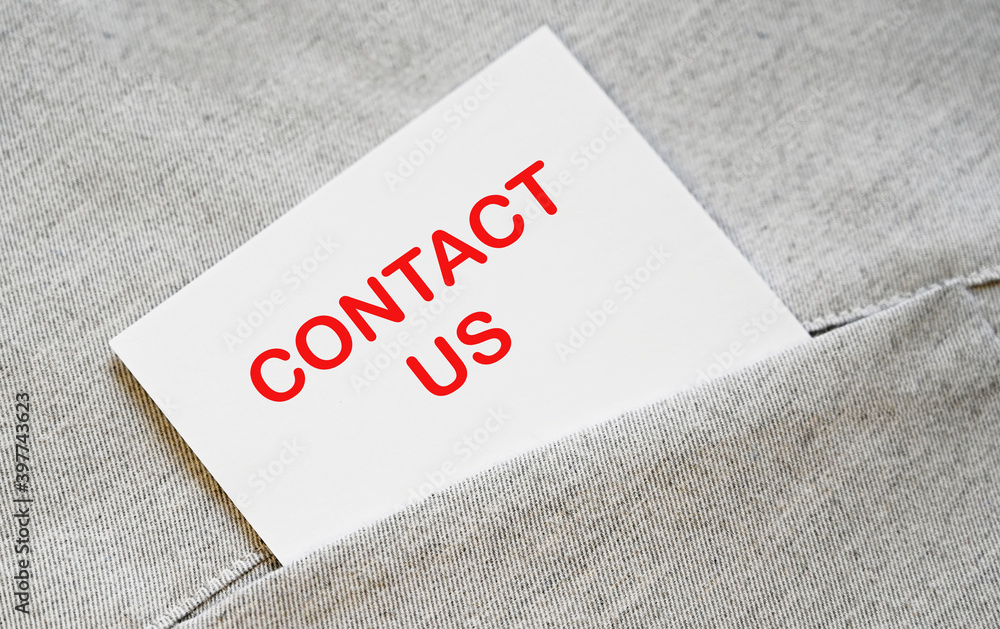 Contact us messag writeen on white sticker in the shirt pocket. Contact us messag writeen on white sticker in the shirt pocket.