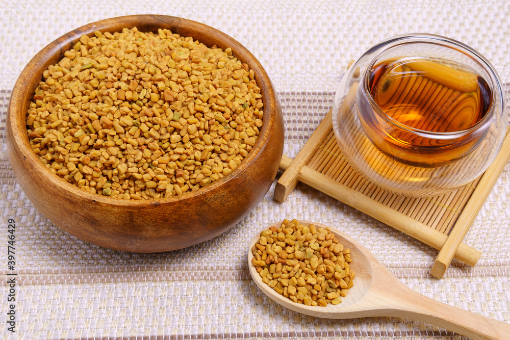 Fenugreek Seeds or MethiDana drink by speaking it in water overnight. close up Fenugreek Seeds or MethiDana drink by speaking it in water overnight. close up