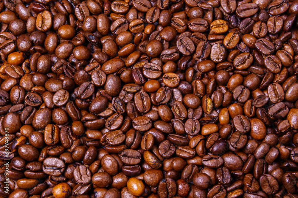 Coffee beans background texture, top view. space for copying text Coffee beans background texture, top view. space for copying text