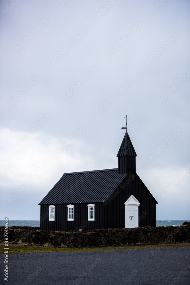 Black Búðakirkja Church in Iceland on a cloudy day