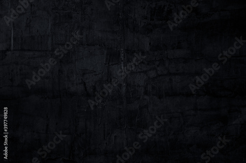 Abstract black concrete wall grunge texture background.