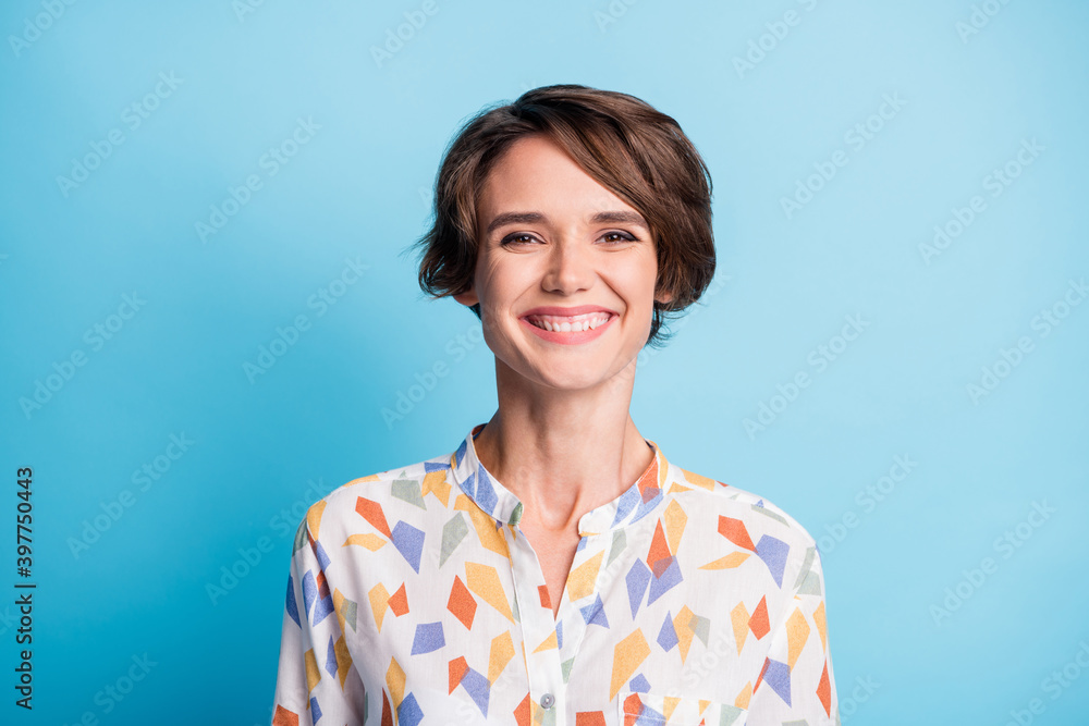 Photo of charming happy young brunette woman beaming smile good mood isolated on blue color background Photo of charming happy young brunette woman beaming smile good mood isolated on blue color background