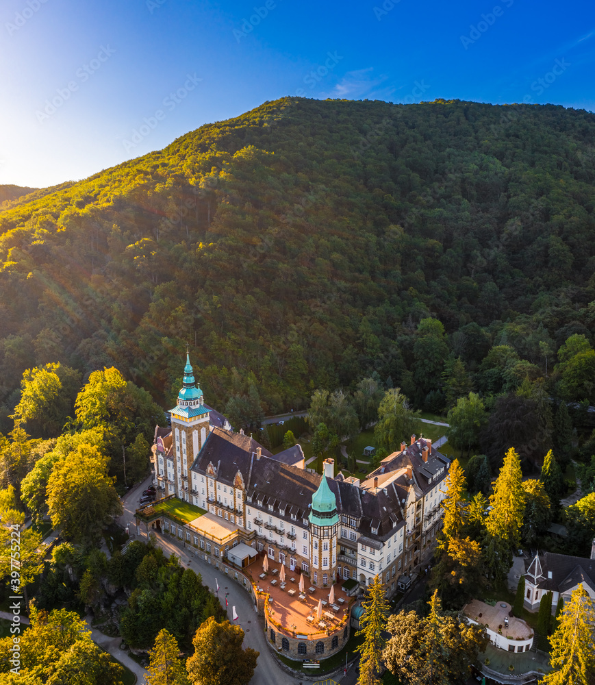 Lillafured, Hungary - Aerial view of the famous Lillafured Castle in the mountains of Bukk near Miskolc on a sunny summer morning with clear blue sky and sunrays Lillafured, Hungary - Aerial view of the famous Lillafured Castle in the mountains of Bukk near Miskolc on a sunny summer morning with clear blue sky and sunrays