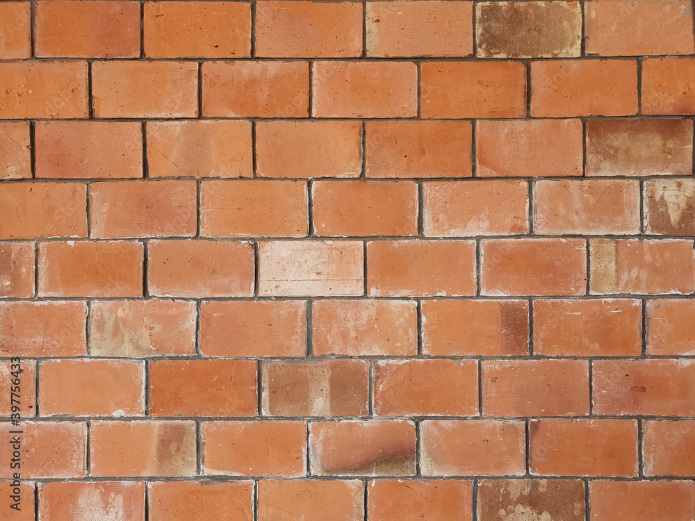 Obraz premium Brick wall with orange brick.Orange brick background.