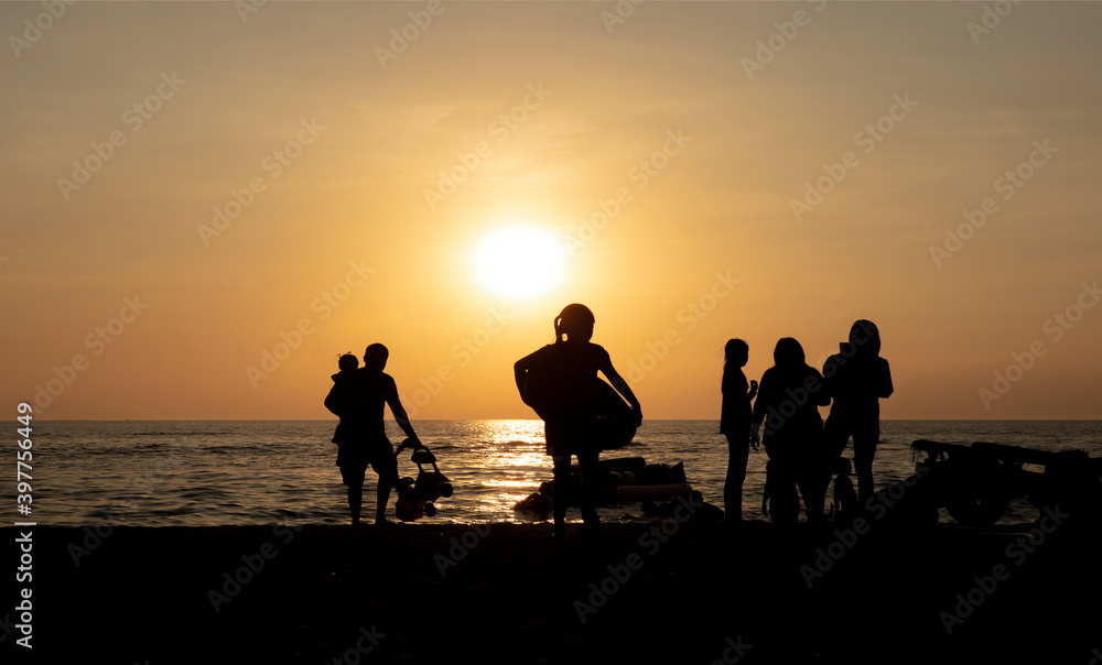 Summer outdoor lifestyle of tourism on Beach againt sunset, Bangsean Beach of Thailand