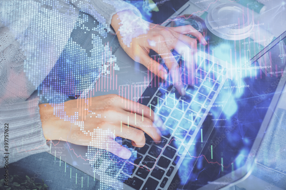 Double exposure of woman hands typing on computer and forex chart hologram drawing. Stock market invest concept. Double exposure of woman hands typing on computer and forex chart hologram drawing. Stock market invest concept.