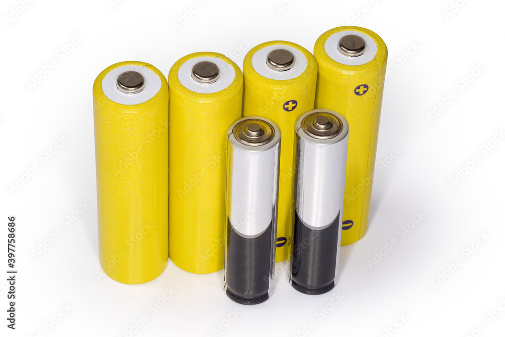 Rechargeable AA batteries and alkaline AAA batteries on white background Rechargeable AA batteries and alkaline AAA batteries on white background