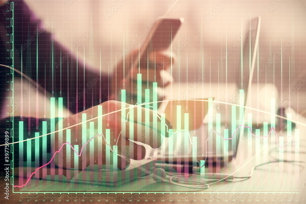 Double exposure of man's hands holding and using a phone and financial graph drawing. Analysis concept. Double exposure of man's hands holding and using a phone and financial graph drawing. Analysis concept.