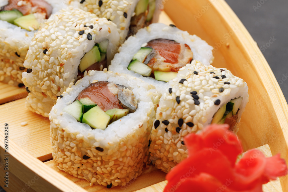 Japanese sushi roll on plate close up