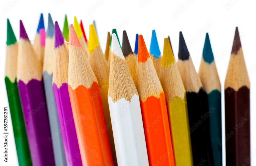 A stack of pencils in many different colors. Studio photo isolated on grey background. A stack of pencils in many different colors. Studio photo isolated on grey background.