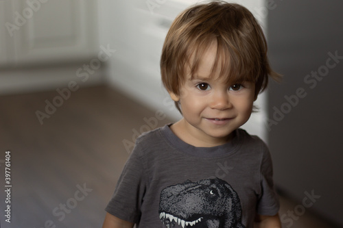 Portrait of a kid with big eyes, close up