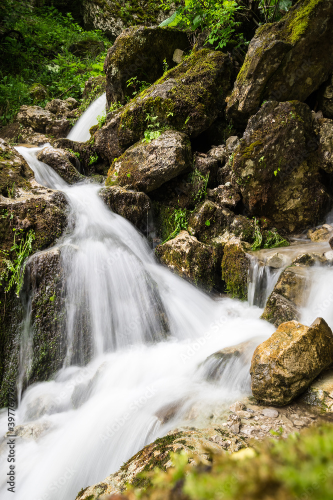 Waterfall in Cherek gorge in the Caucasus mountains in Russia