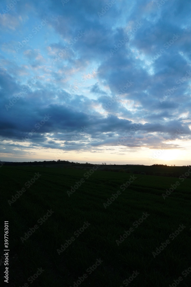 colourful sunset sky over fields in essex, photographed in April 2017 colourful sunset sky over fields in essex, photographed in April 2017