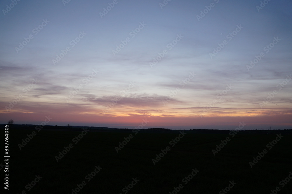 colourful sunset sky over fields in essex, photographed in April 2017 colourful sunset sky over fields in essex, photographed in April 2017