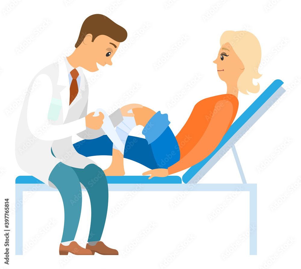 Leg injured patient doing consultation to a doctor. The girl lies on the bed and looks at the man. Patient and doctor isolated on white background. Orthopedist puts a bandage on the knee of a woman Leg injured patient doing consultation to a doctor. The girl lies on the bed and looks at the man. Patient and doctor isolated on white background. Orthopedist puts a bandage on the knee of a woman