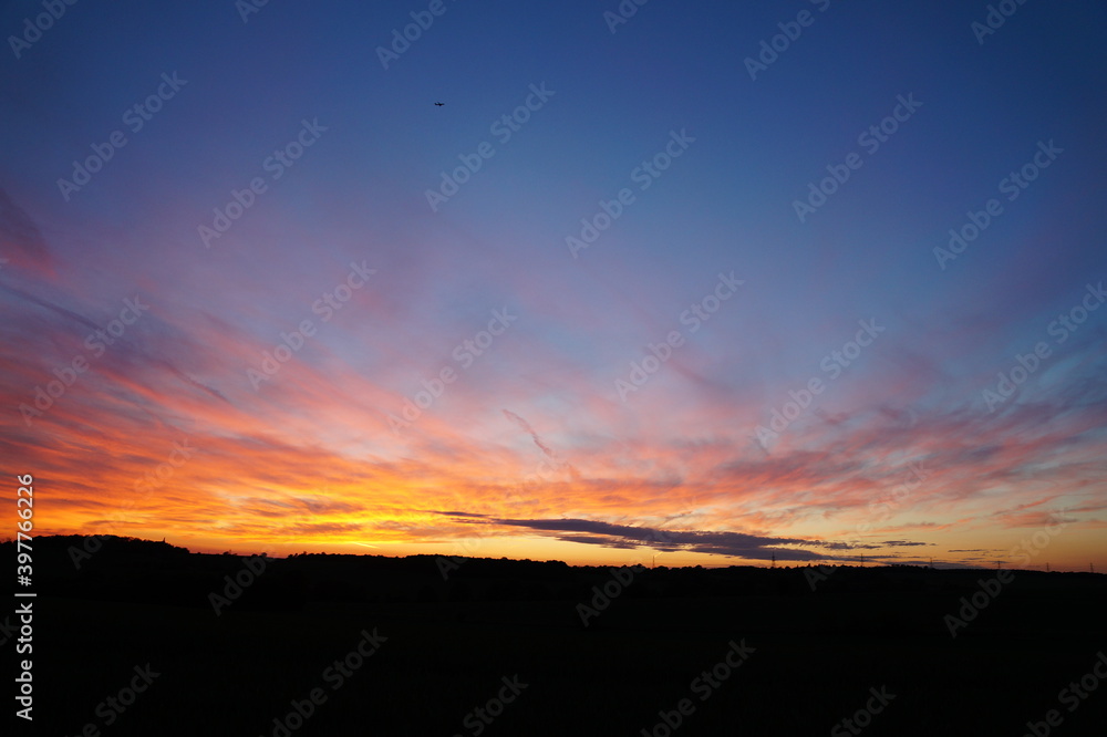 Colourful sunset sky, all colours, pinks, oranges and blues