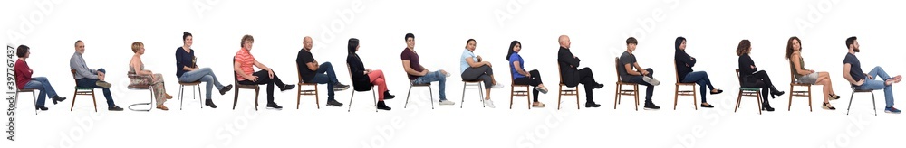 Obraz premium Group of people sitting cross-legged on white background