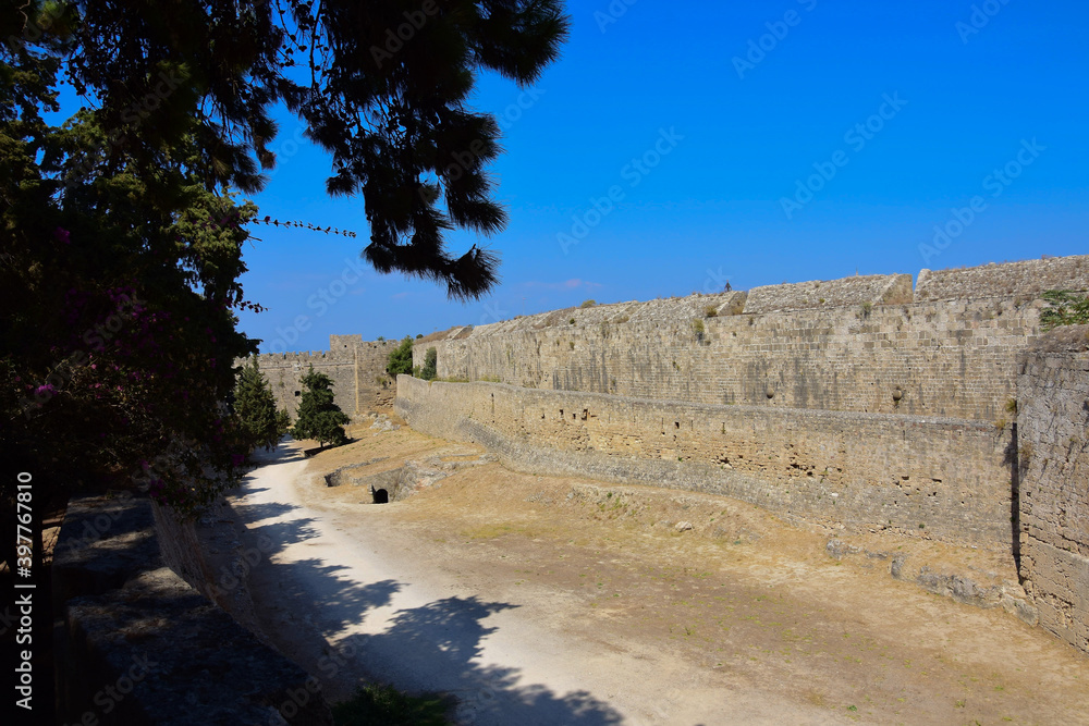 A view of the ancient walls of the old town of Rhodes on the Greek island of Rhodes.