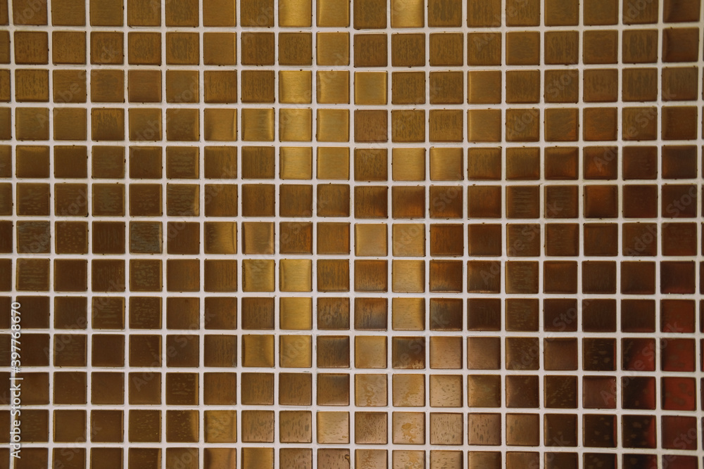 Fototapeta premium metallic beige bronze tile wall background