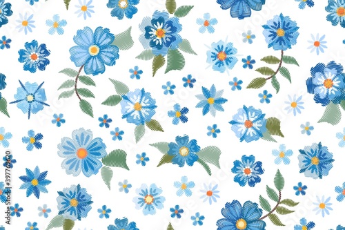 Embroidery seamless pattern with blue wild flowers on white background. Fashion design for fabric, textile, wrapping paper. Fancywork print. Vector illustration.