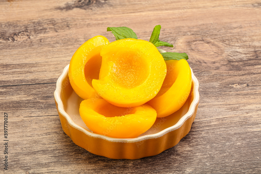 Sweet ripe canned peaches with mint Sweet ripe canned peaches with mint