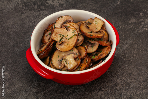 Roasted champignon with herbs and spices