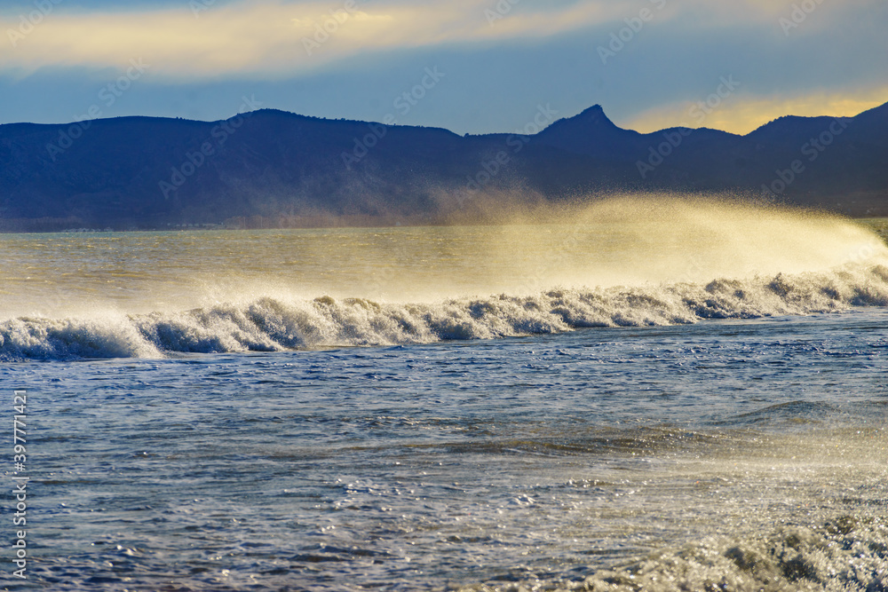 Sea waves forming white foam on sunny day. Sea waves forming white foam on sunny day.