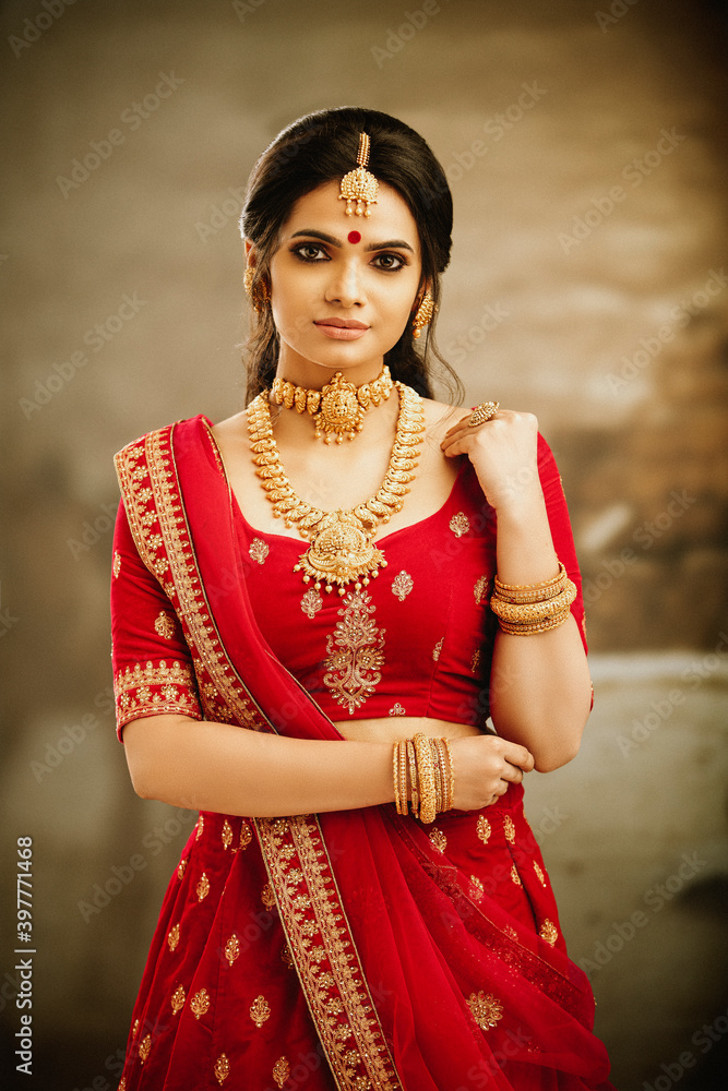 Beautiful Indian traditional woman portrait on white.