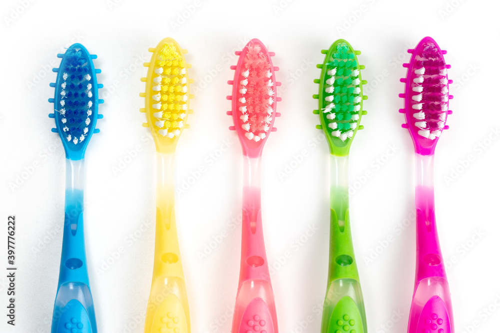 Set colorful toothbrushes on white background Set colorful toothbrushes on white background