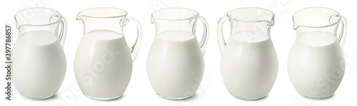 Set of big milk jars isolated on white background. Glass pitchers for diary products